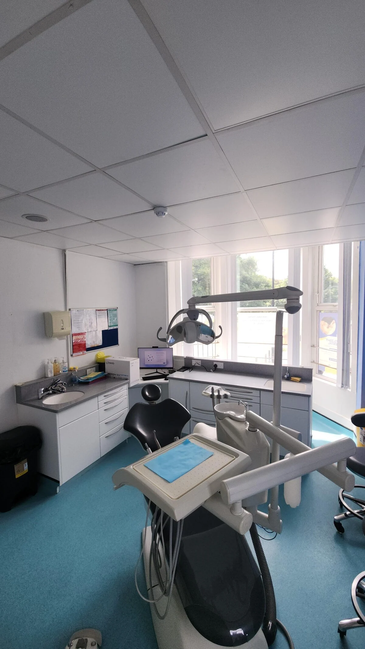 Twilight Dental treatment room with dental chair and bright natural light